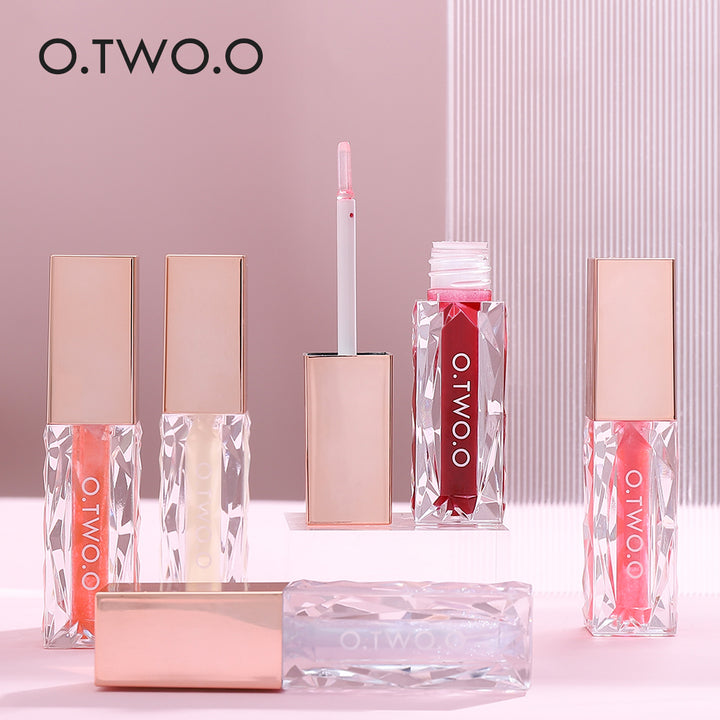 O.TWO.O: Brillo labial clear crystal berry en 5 colores
